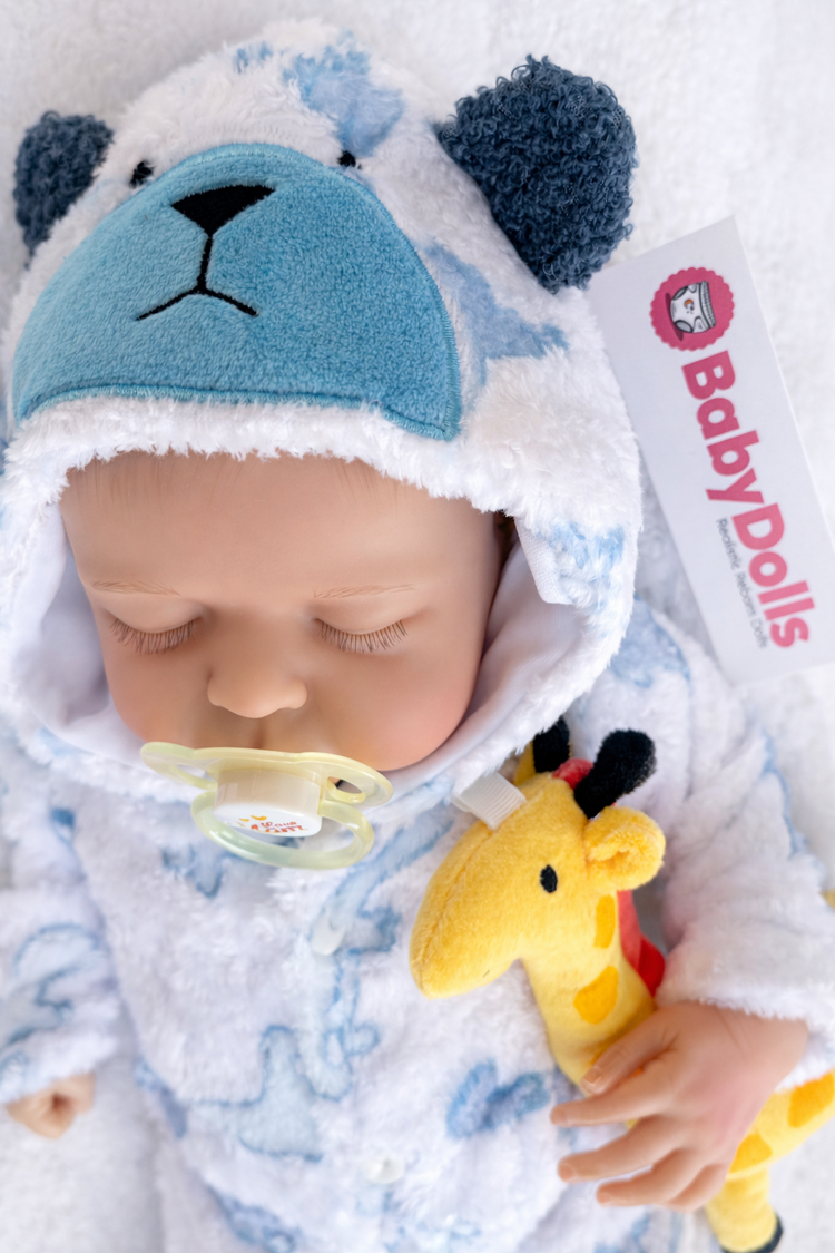 hand-painted vinyl reborn doll wearing a teddy bear hat